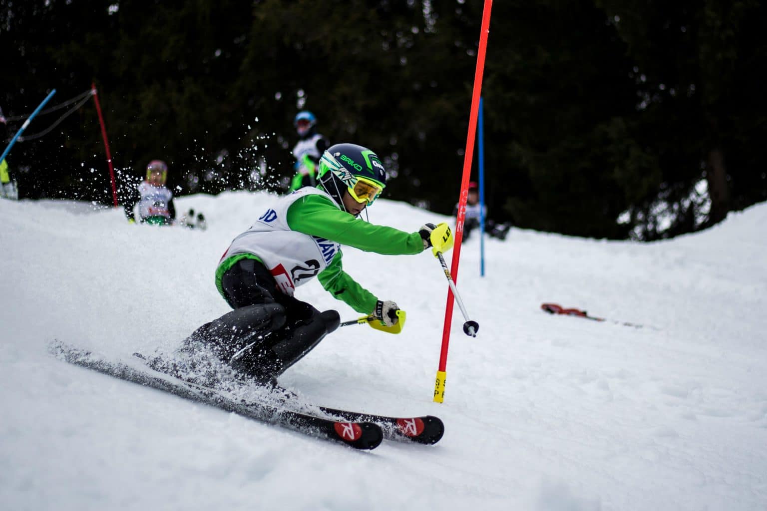 boy skiing down a hill