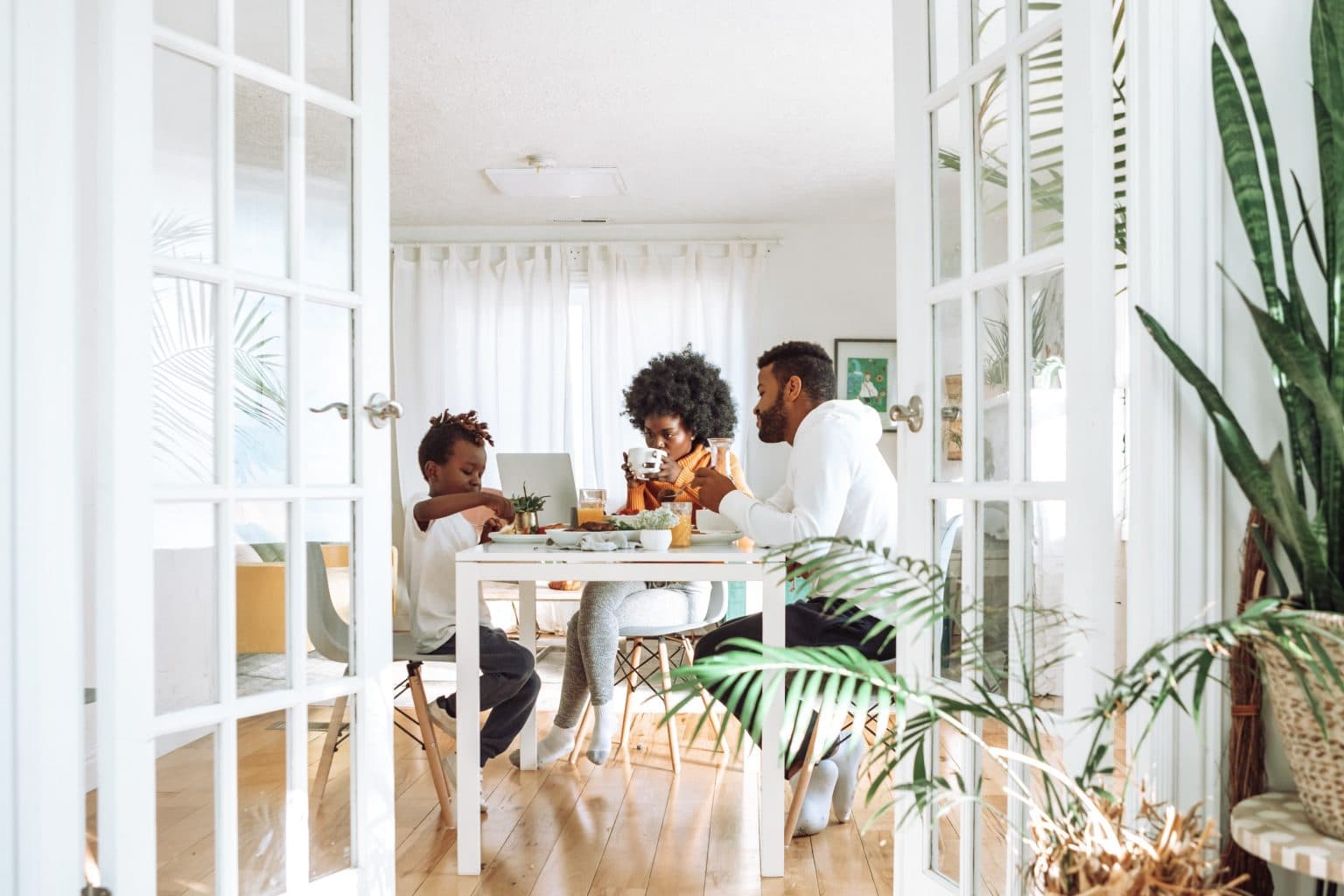 family eating breakfast at the table