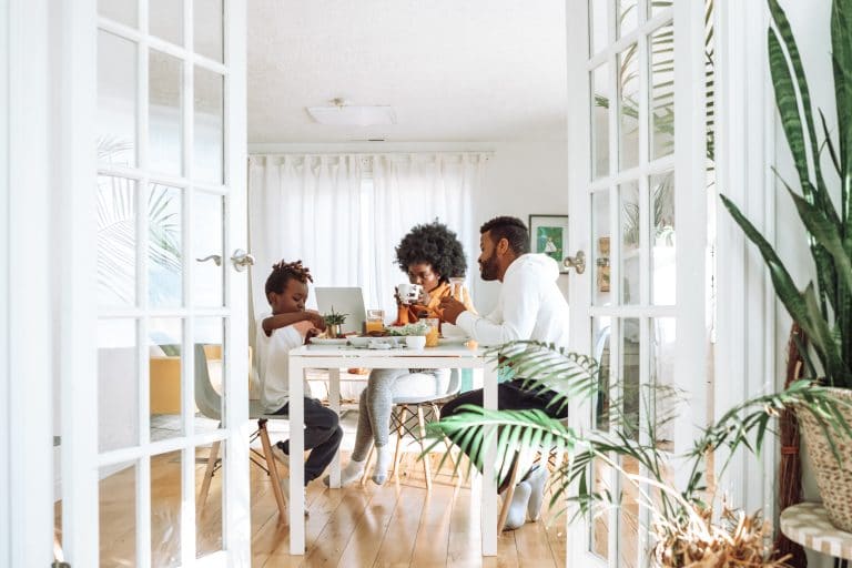 family eating breakfast at the table