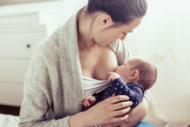 mother breastfeeding her baby