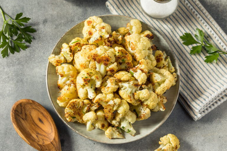 Cauliflower popcorn on a white plate