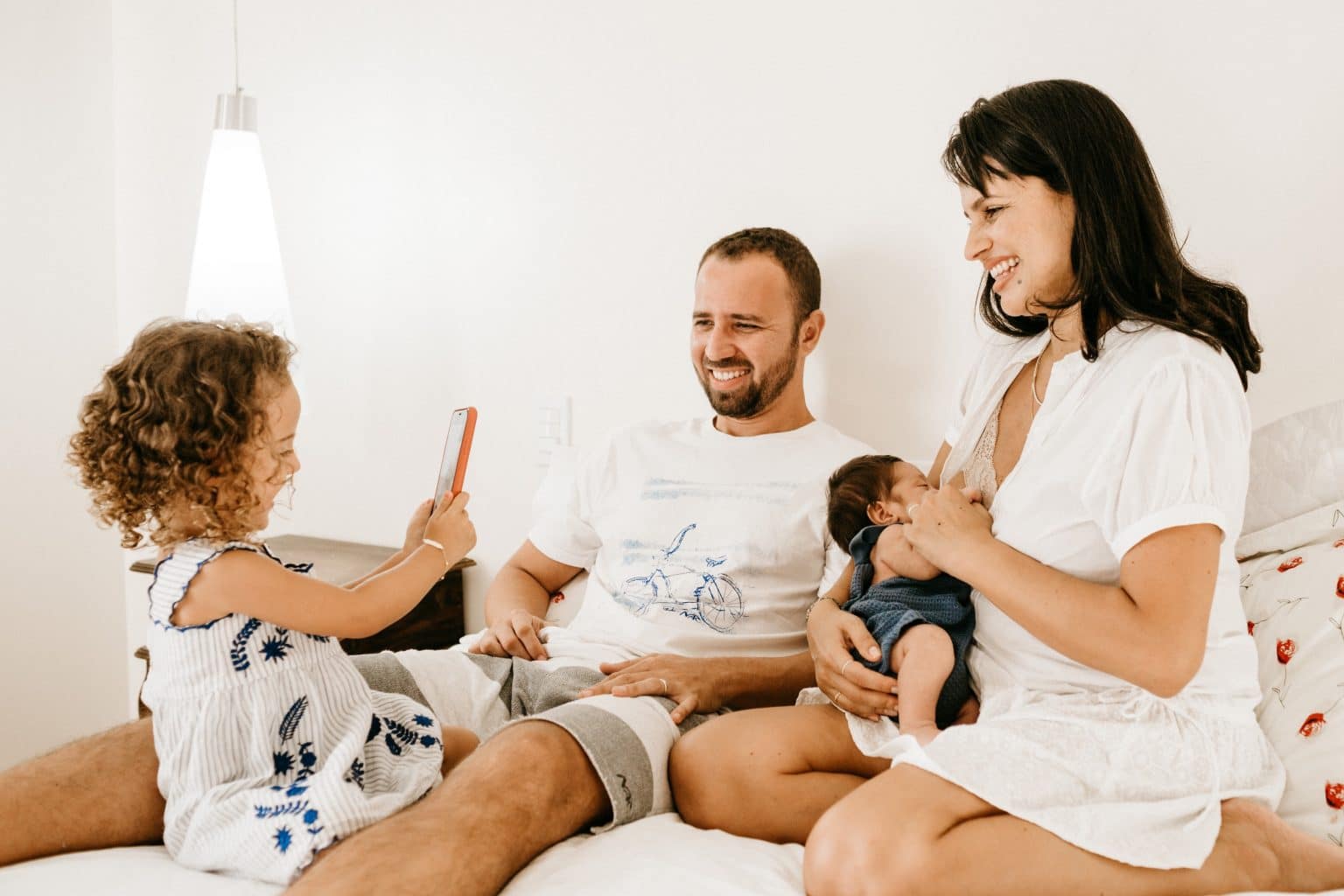 family laughing and spending time together inside