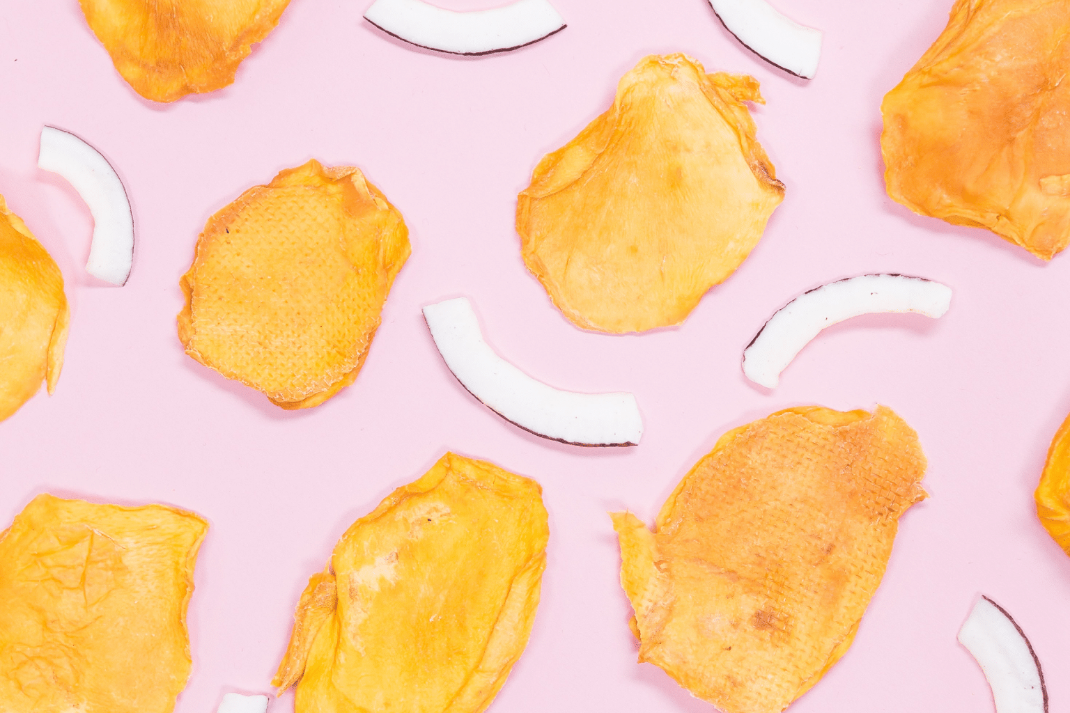 dried fruit on a pink background