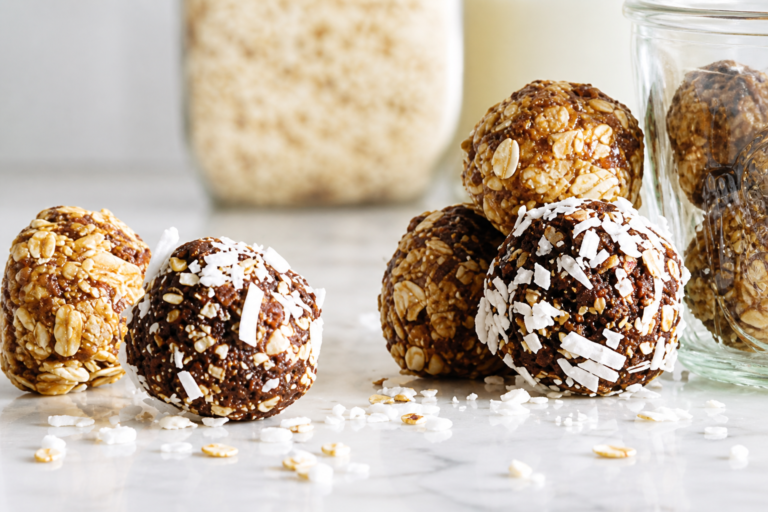 Nut-free energy bites on a white countertop