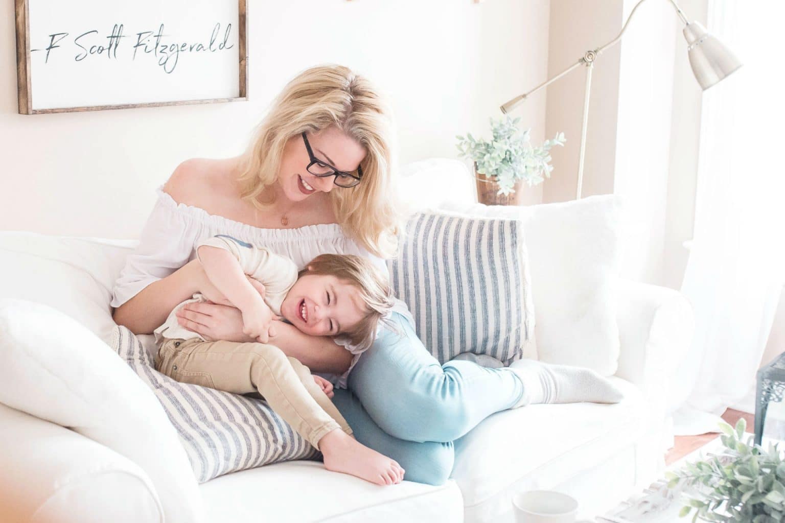 mother and daughter on a couch