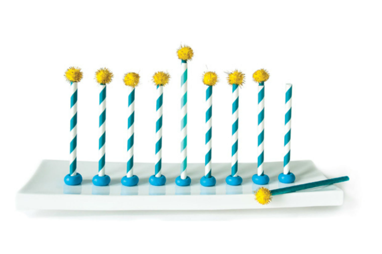 straws with pom poms to make a menorah