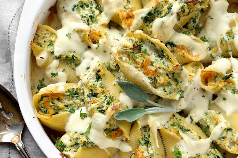 ricotta and squash stuffed shells in a casserole dish