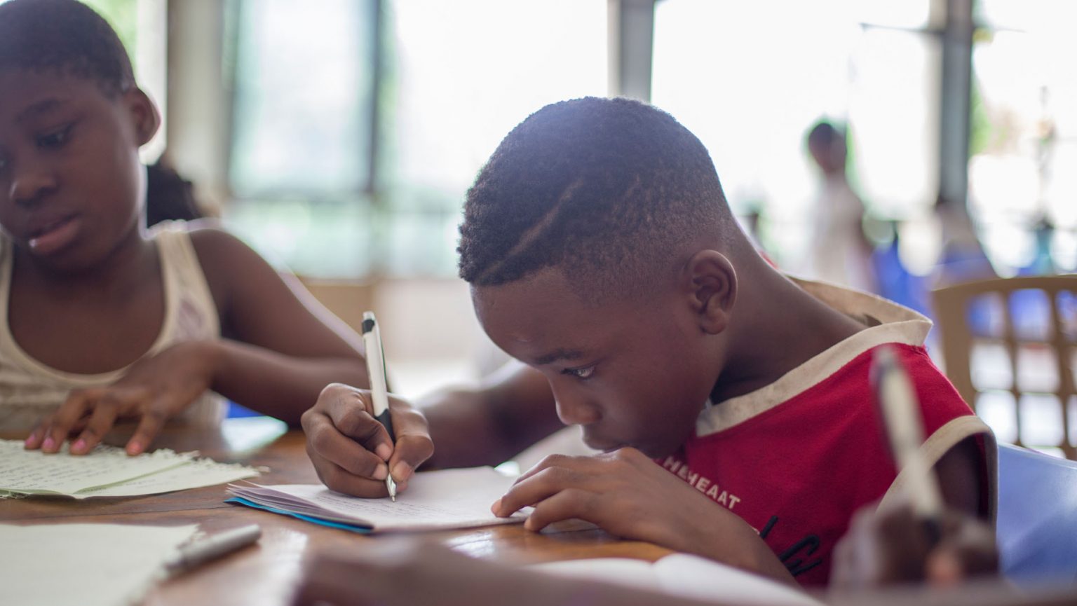 child doing schoolwork