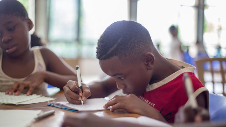 child doing schoolwork