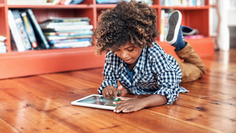 Boy using Smartick on tablet
