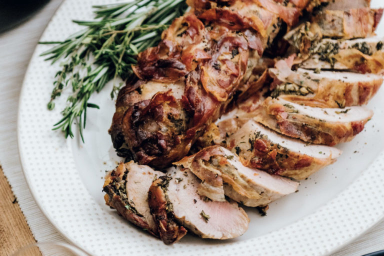 pork roast with herbs on a plate