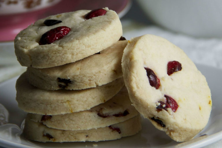 stack of shortbread cookies studded with cranberries