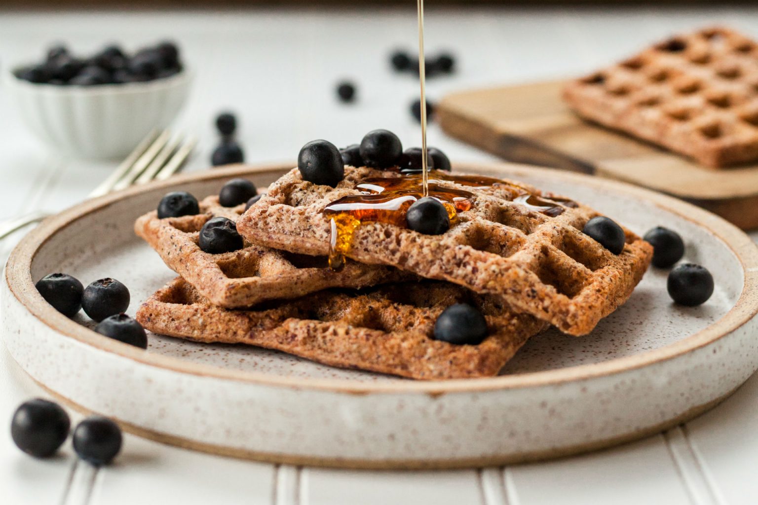 stack of waffles with berries