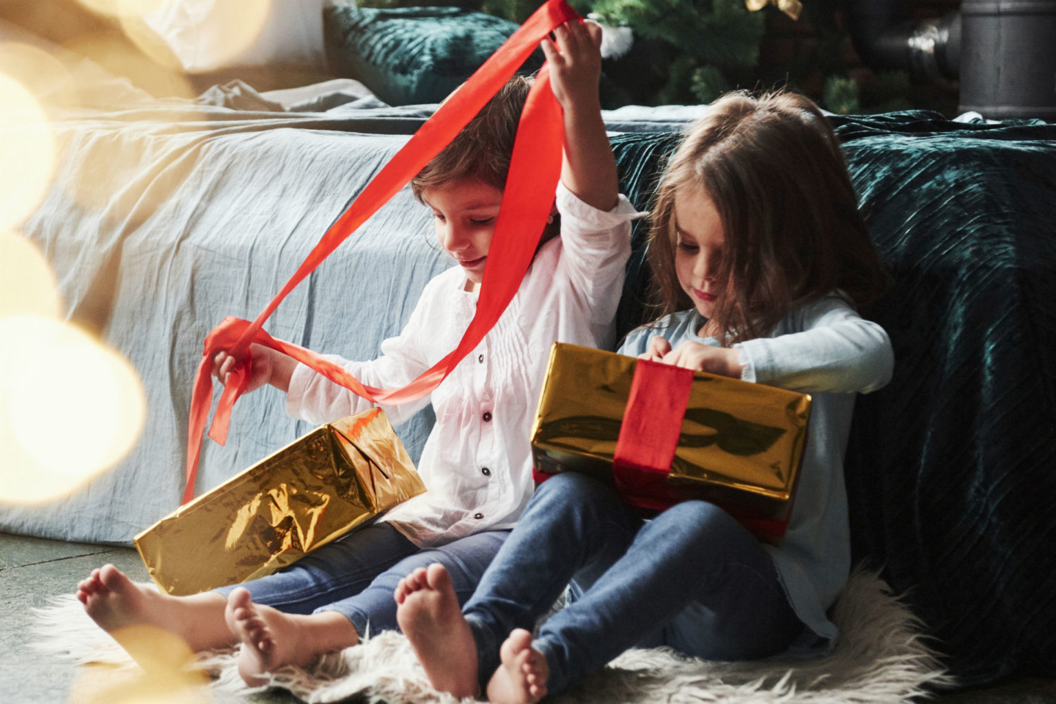 kids opening a gift