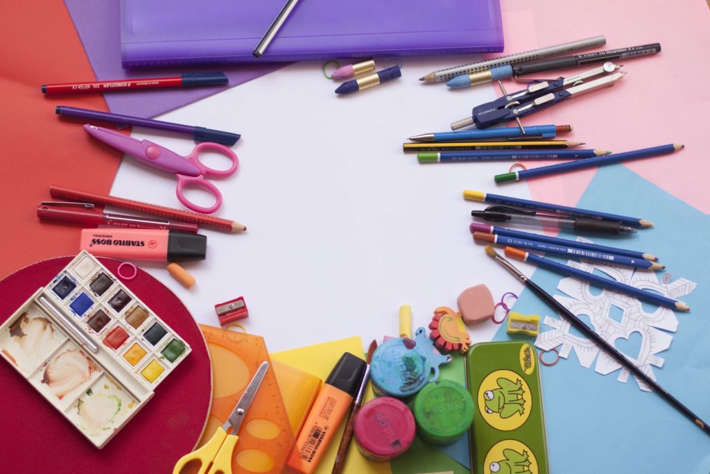 An overhead shot of art and school supplies