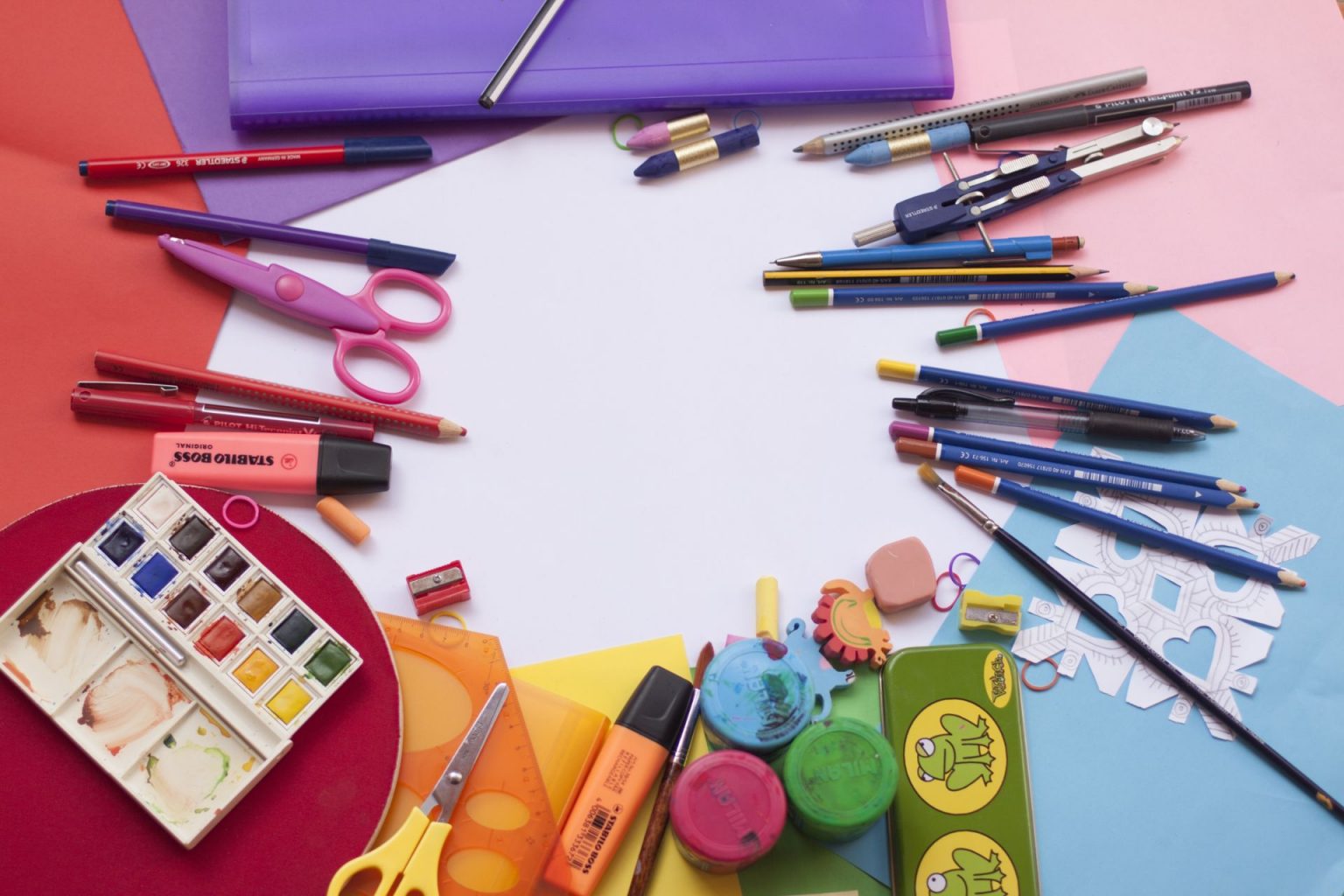 An overhead shot of art and school supplies