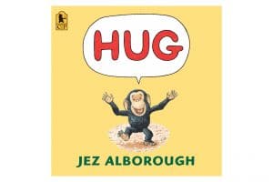 Yellow book with a monkey saying "Hug" on the cover