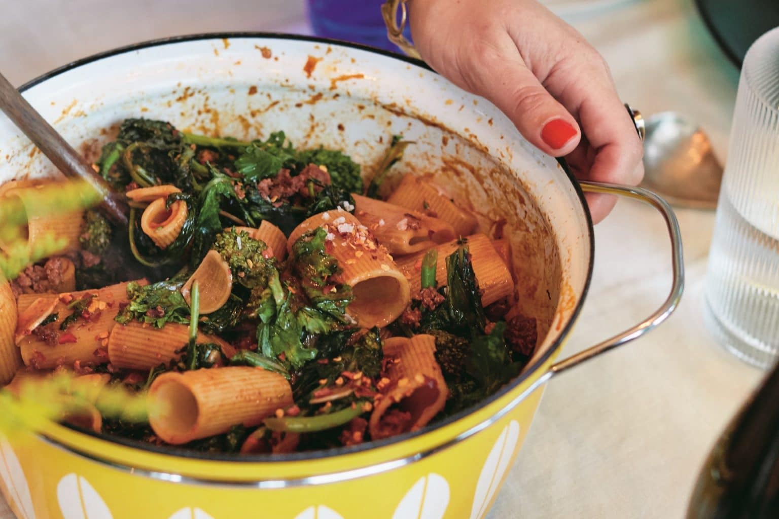 pot of pasta with broccoli and bread crumbs