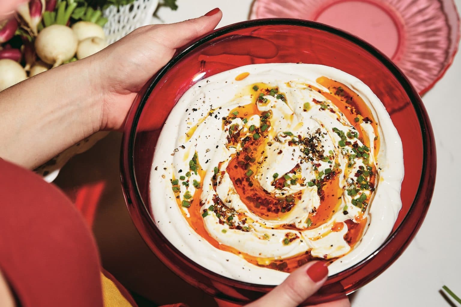 bowl of dip with chili oil and garnish on top