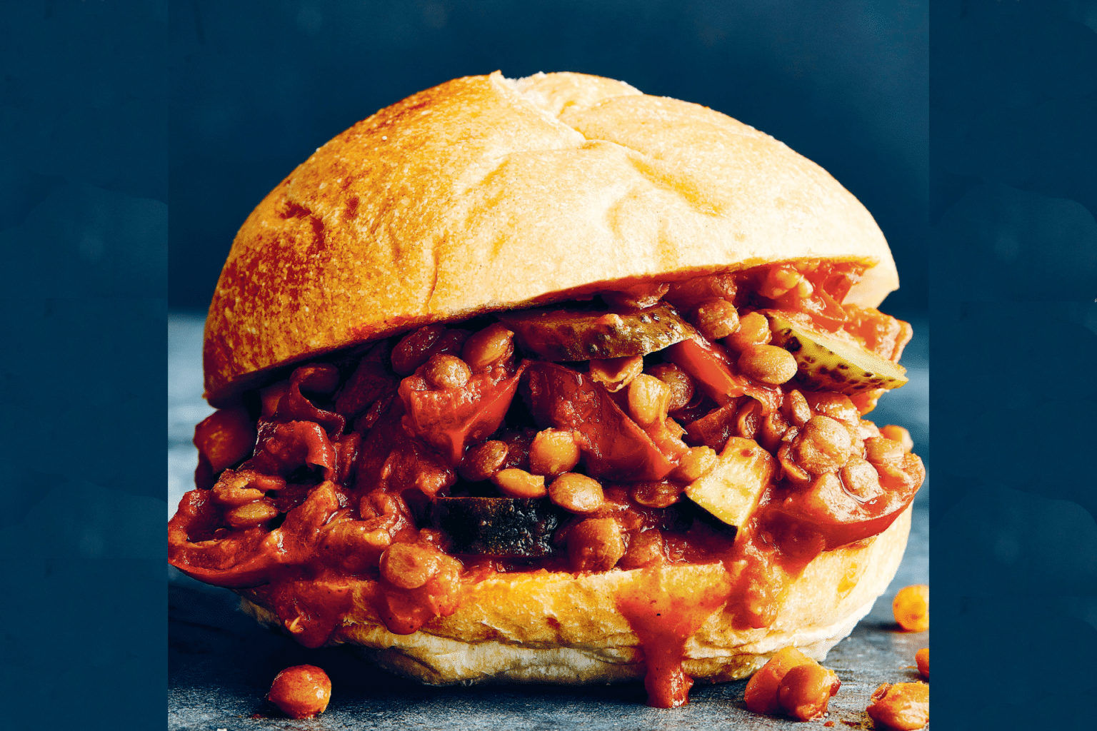 bun piled with saucy beans