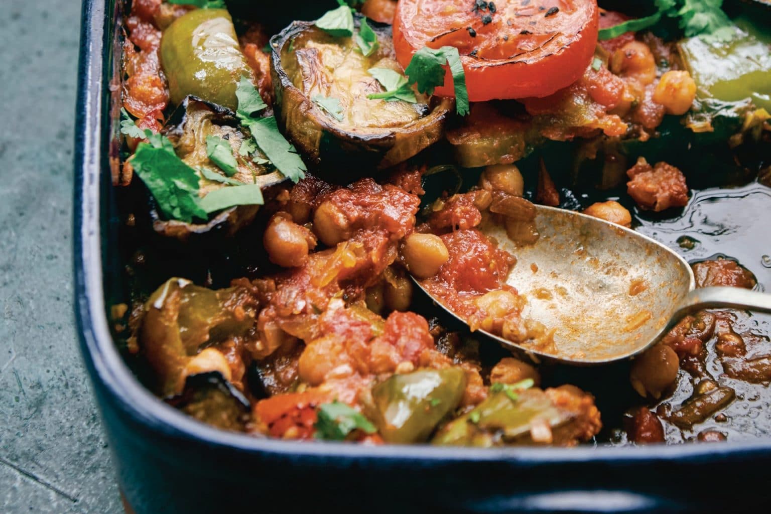 casserole dish filled with chickpeas and roasted vegetables