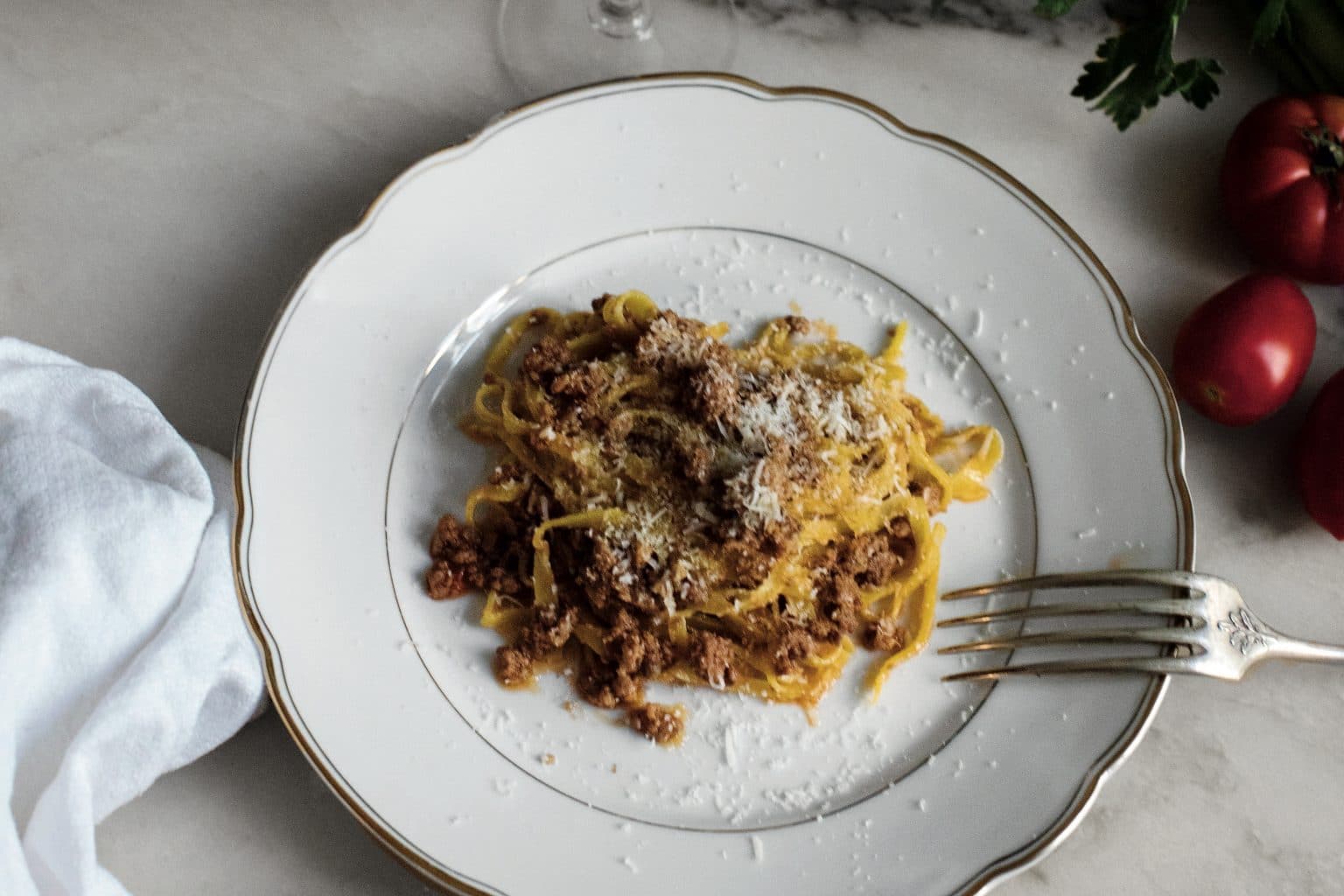 plate of bolognese on fresh pasta