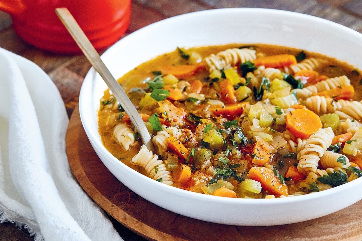 bowl of noodle soup loaded with veggies