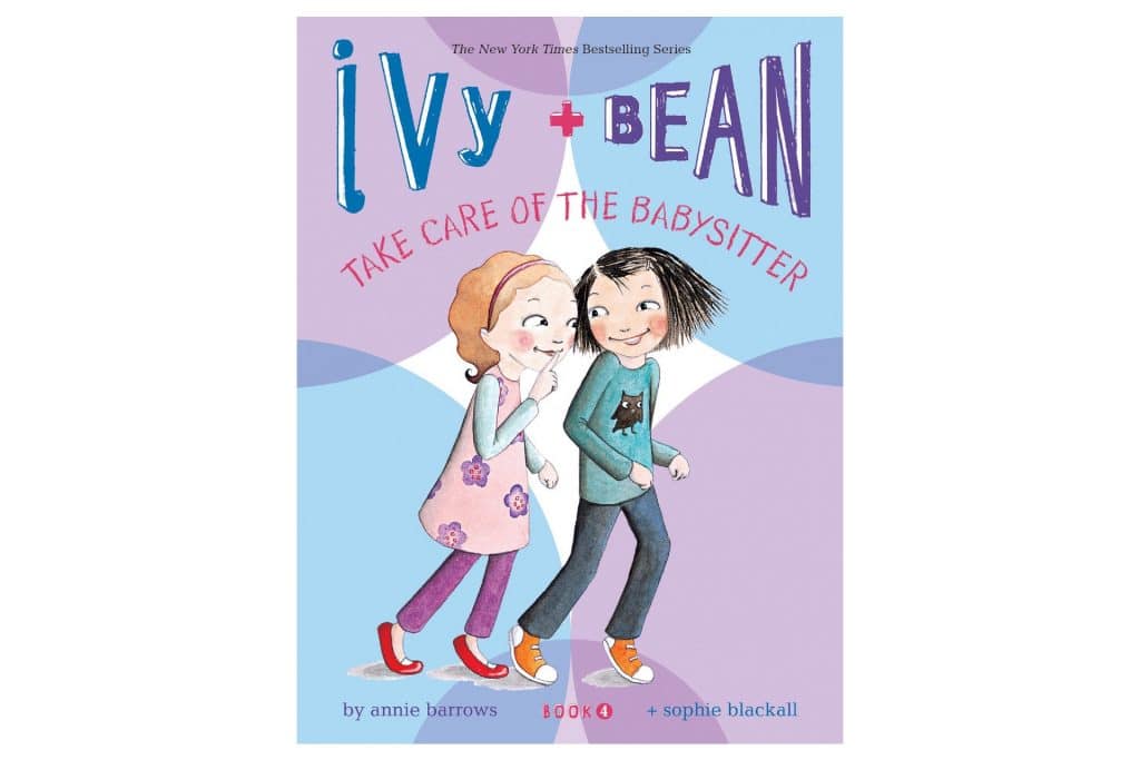 purple and blue book cover with two little girls