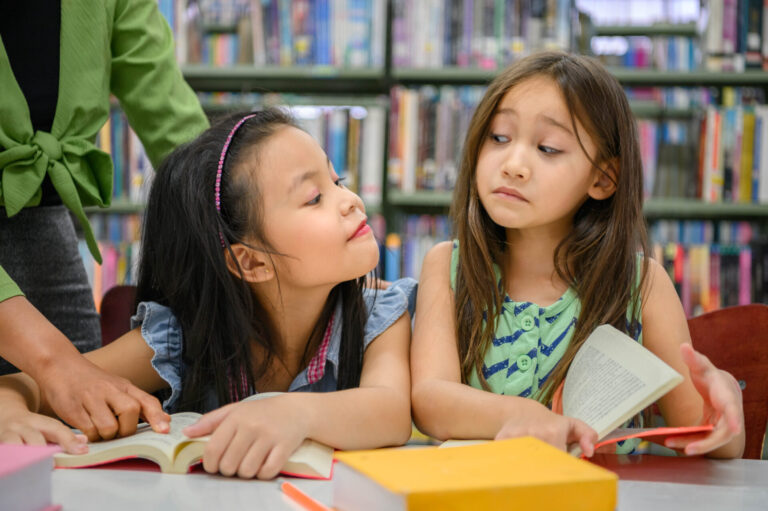 Little girl who looks envious, to illustrate kids who feel jealous of wealthy friends