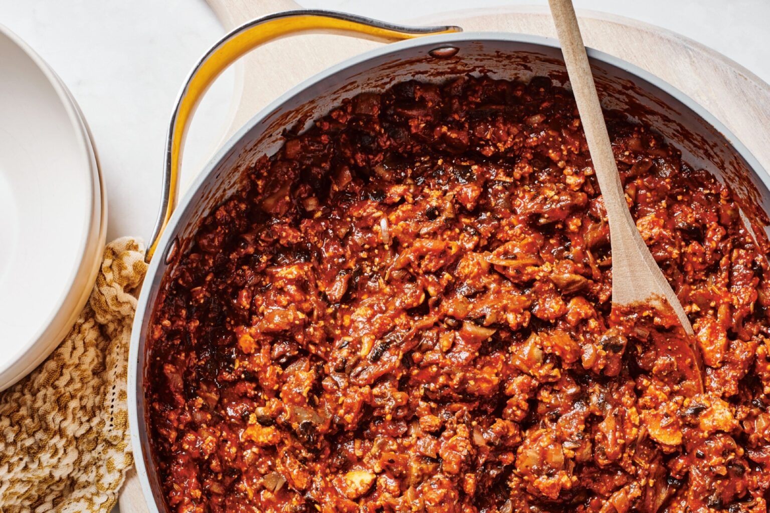 dish of rich tomatoey vegan sausage bolognese