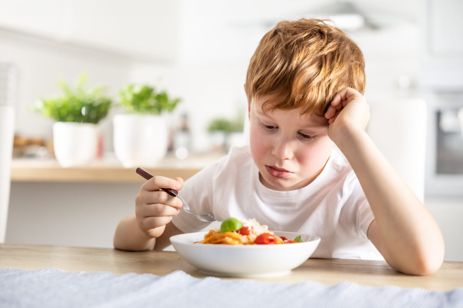 young boy being a choosy eater