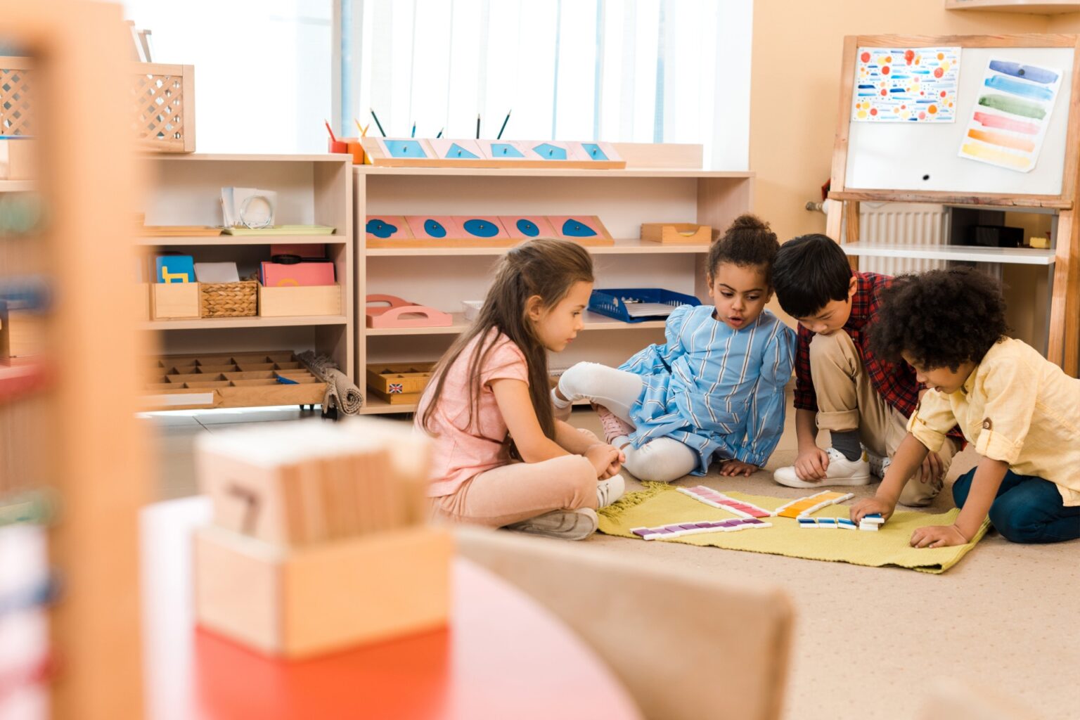 a group of children playing on the floor