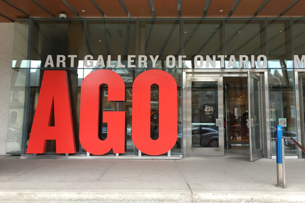 The Art Gallery of Ontario entrance with the letters AGO in deep red. A beloved Torontonian destination.