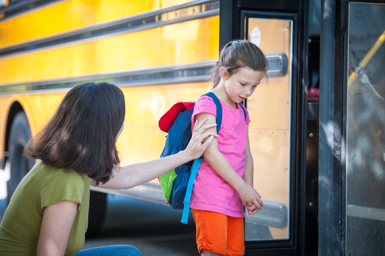 Parent and discouraged child, to illustrate how to help with low self-esteem in children