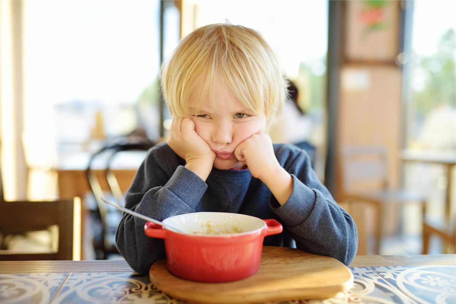 Preschooler pouting and looking out of control