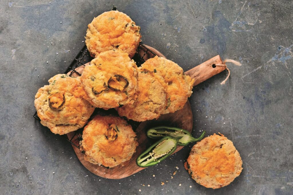 A serving board covered in jalapeno cheddar scones