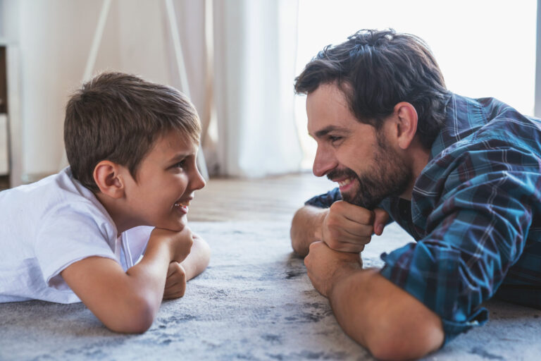 Dad and son having a conversation to illustrate emotional literacy