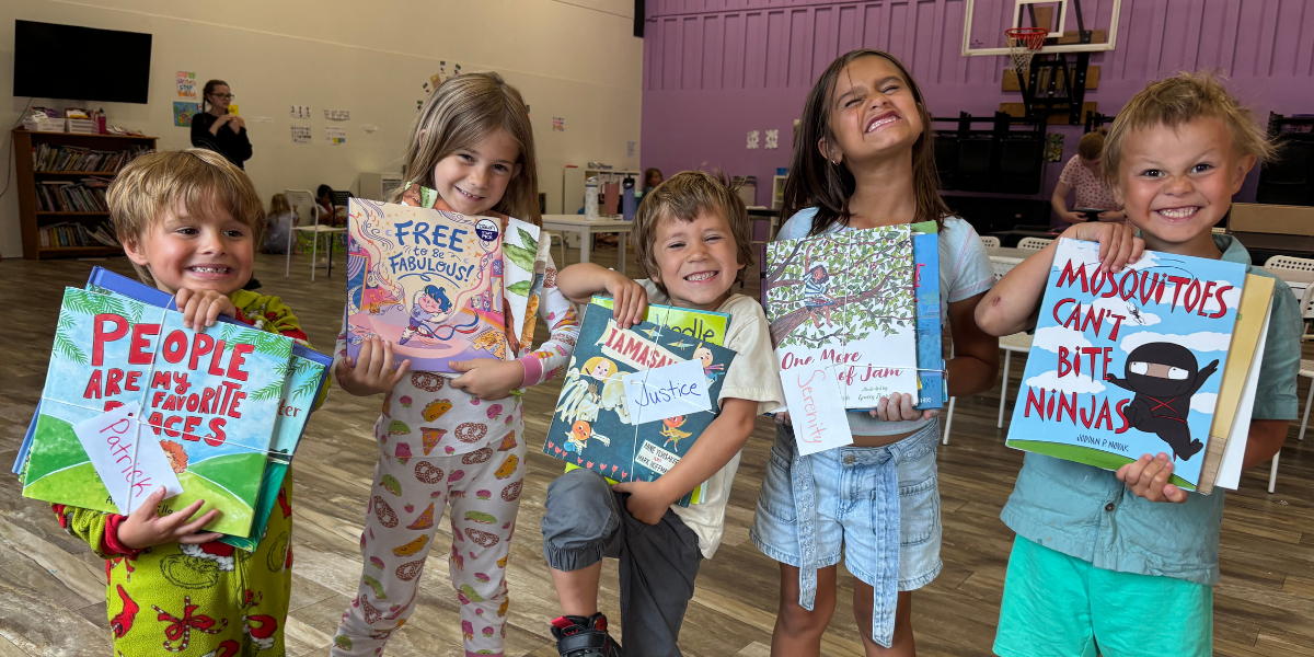 United for Literacy - children holding their favourite books