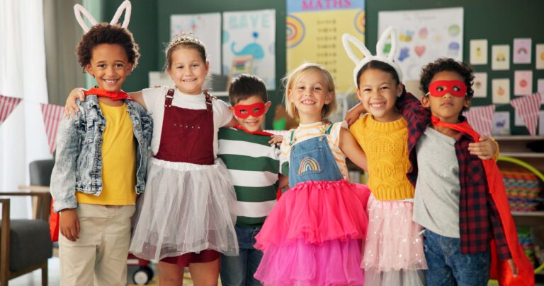 Group of kids in silly costume to show how spirit day items can be used
