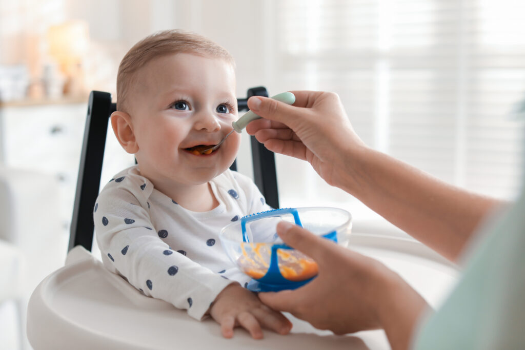 Baby eating solid foods