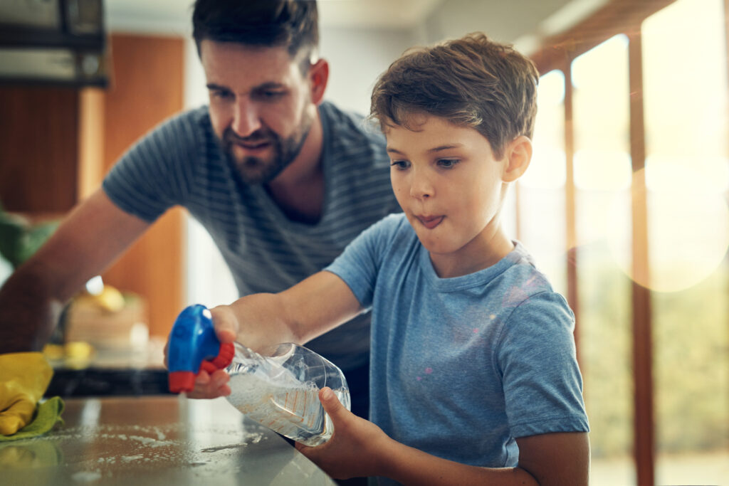 Dad and son cleaning to show "minorstones" of growth