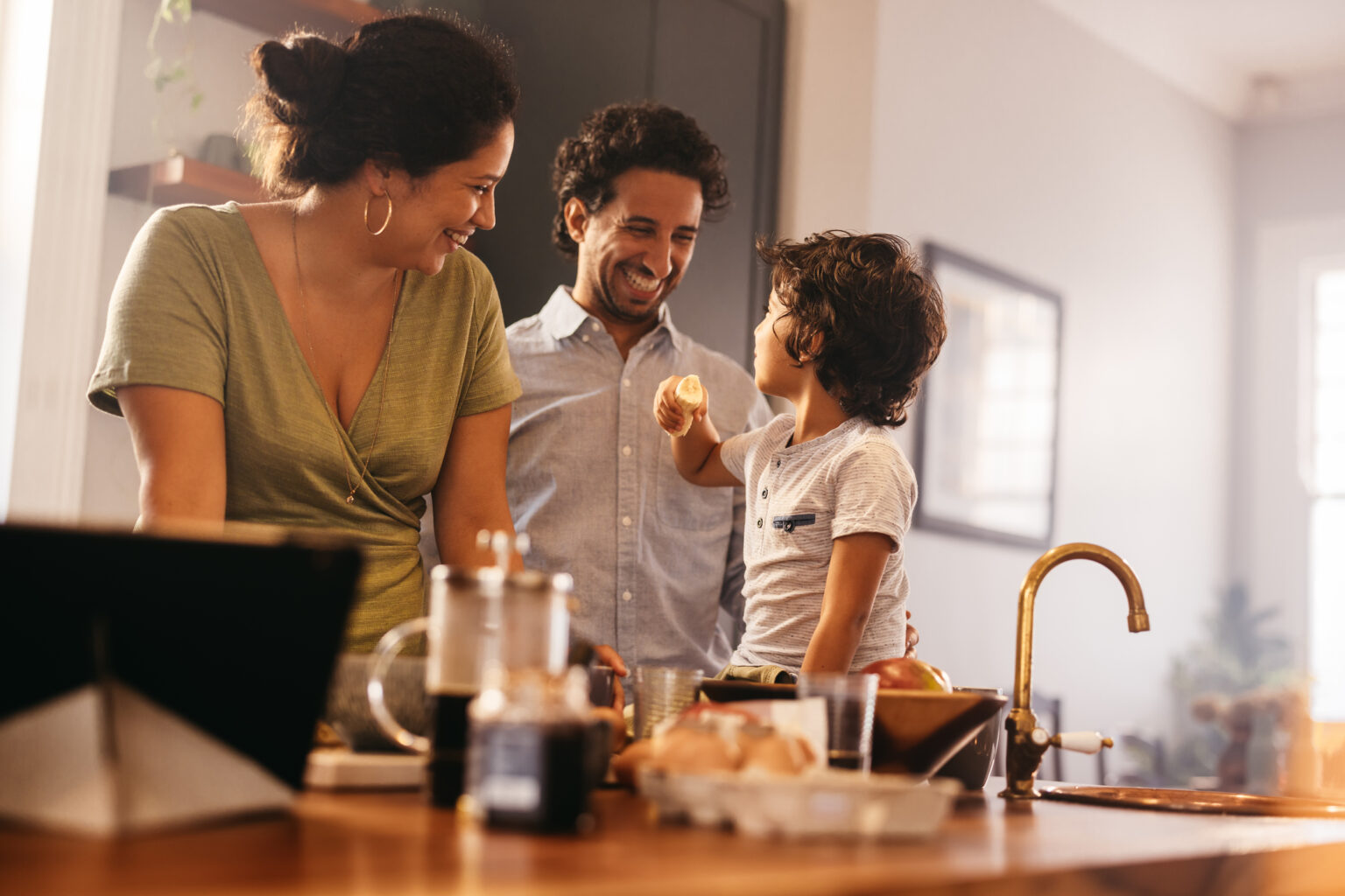 Type C parenting example of a family in the kitchen cooking